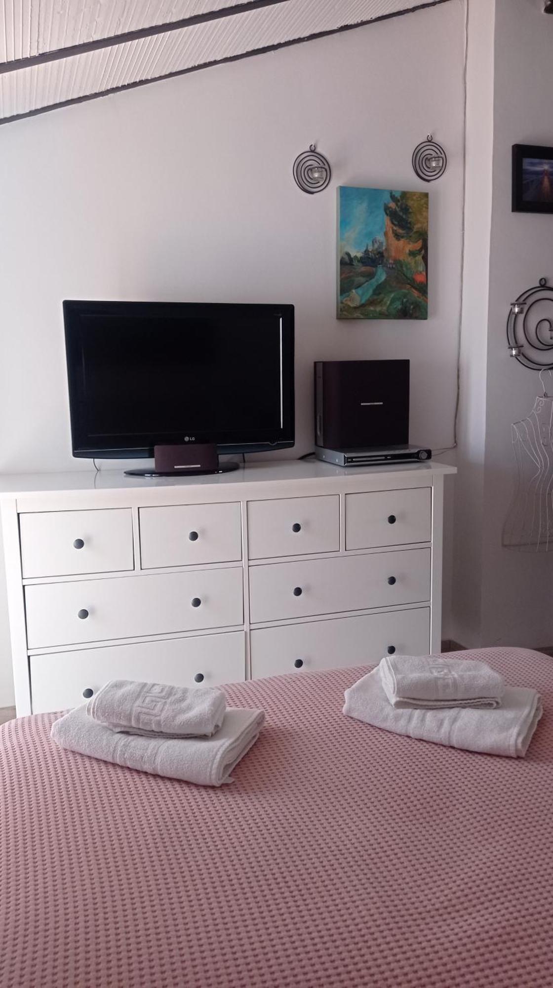 Quarto em Acomodações Particulares De Invitados De Casa Tais